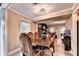 Open-concept dining area with natural light, seamlessly connected to living spaces at 4364 Saddlecreek Ct, Auburn, GA 30011