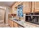 Kitchen with granite countertops, stainless steel appliances, and custom cabinetry at 4364 Saddlecreek Ct, Auburn, GA 30011