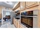 Kitchen with granite countertops, stainless steel appliances, and custom cabinetry at 4364 Saddlecreek Ct, Auburn, GA 30011
