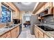 Open concept kitchen with granite countertops and stainless steel appliances at 4364 Saddlecreek Ct, Auburn, GA 30011