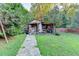 A backyard storage shed with tools and supplies at 4364 Saddlecreek Ct, Auburn, GA 30011