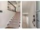 Bright entryway with staircase, light walls, and hardwood floors at 540 Woodall Ne Ave, Atlanta, GA 30306
