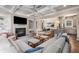Spacious living room is open to the kitchen and dining area with hardwood floors at 540 Woodall Ne Ave, Atlanta, GA 30306
