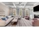 Open concept living room with fireplace, hardwood floors and high ceilings at 540 Woodall Ne Ave, Atlanta, GA 30306