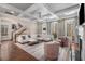 Open concept living room with fireplace, hardwood floors and high ceilings at 540 Woodall Ne Ave, Atlanta, GA 30306