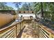 Spacious backyard featuring a wooden bridge and deck, perfect for outdoor entertaining and relaxation at 2392 Jefferson Ter, Atlanta, GA 30344