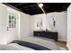 Cozy bedroom with a modern dresser and decor creating a calm and inviting space at 2392 Jefferson Ter, Atlanta, GA 30344