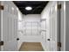 Walk-in closet with white shelving and ample space for storage; organized and easily accessible at 2392 Jefferson Ter, Atlanta, GA 30344