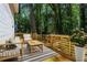 Relaxing deck space with comfortable seating and lush greenery views, creating a tranquil outdoor retreat at 2392 Jefferson Ter, Atlanta, GA 30344