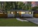 Charming exterior view of home featuring a well-manicured lawn and driveway at 2392 Jefferson Ter, Atlanta, GA 30344