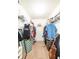 Neat walk-in closet with built-in shelving for organized storage and convenience at 310 Morning Glen Dr, Suwanee, GA 30024