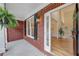 Welcoming entryway with hardwood floors, white trim, and an open view to the living area at 3958 Windgrove Xing, Suwanee, GA 30024