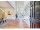 Inviting entryway with hardwood floors, soaring ceilings, and an open floor plan at 3958 Windgrove Xing, Suwanee, GA 30024