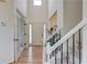 Grand foyer with staircase, hardwood floors, and lots of natural light at 3958 Windgrove Xing, Suwanee, GA 30024