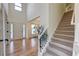 Spacious foyer with a view of the front door and staircase at 3958 Windgrove Xing, Suwanee, GA 30024