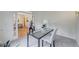 Bright office with neutral decor, a modern desk, and views of the dining room at 3958 Windgrove Xing, Suwanee, GA 30024