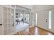 Bright office space with glass French doors, neutral carpet, and natural light at 3958 Windgrove Xing, Suwanee, GA 30024