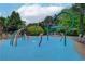 Community splash pad with colorful, playful features, providing a safe and fun water area for children at 3958 Windgrove Xing, Suwanee, GA 30024