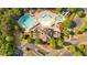 Aerial view of a community pool with a lazy river, slides and ample parking at 409 Retreat Ln, Canton, GA 30114