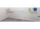 Walk in closet with white wire shelving and gray carpet at 409 Retreat Ln, Canton, GA 30114