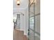 Grand entryway with hardwood floors, an elegant staircase, and a view into the spacious living area at 409 Retreat Ln, Canton, GA 30114