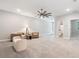 A large open living room area with neutral decor at 409 Retreat Ln, Canton, GA 30114