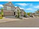 Street view featuring craftsman-style townhouses with inviting curb appeal in a well-maintained neighborhood at 409 Retreat Ln, Canton, GA 30114