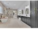 Luxurious bathroom with dual vanities, a standalone tub, and a large frameless glass shower at 4881 Bill Cheek Rd, Auburn, GA 30011