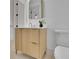 Stylish bathroom vanity with gold hardware, modern faucet, and elegant mirror at 4881 Bill Cheek Rd, Auburn, GA 30011