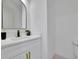 Modern bathroom featuring a stylish mirror, sink, and vanity at 4881 Bill Cheek Rd, Auburn, GA 30011