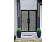 Up-close view of a home's elegant double glass door with modern lighting at 4881 Bill Cheek Rd, Auburn, GA 30011