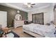 A spacious main bedroom featuring a tray ceiling and neutral carpet at 1316 Plaza Sw Ave, Atlanta, GA 30310