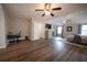 Large main bedroom featuring modern flooring, ceiling fan, sitting area, and lots of natural light at 1412 Shelnutt Ct, Hampton, GA 30228