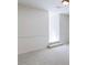 A light-filled bedroom features neutral carpet, neutral walls with white trim, and a ceiling light at 3485 Aubusson Trce, Johns Creek, GA 30022