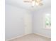 A cozy bedroom featuring light-blue walls and carpet floors at 5873 Trellis Ct, Powder Springs, GA 30127