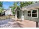 A nice wooden deck with view to the backyard at 5873 Trellis Ct, Powder Springs, GA 30127