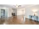Bright living room with hardwood floors offers a welcoming atmosphere for gatherings at 5873 Trellis Ct, Powder Springs, GA 30127