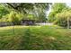 Spacious backyard showcasing a modern shed, manicured lawn, and recreational spaces at 991 Columbia Dr, Decatur, GA 30030