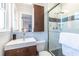 Modern bathroom featuring a glass-enclosed shower and sleek vanity with stylish fixtures at 991 Columbia Dr, Decatur, GA 30030