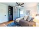 Bright bedroom with light walls, hardwood floors, closet, and a cozy queen bed at 991 Columbia Dr, Decatur, GA 30030