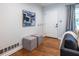 Inviting entryway with hardwood floors, modern decor, and convenient coat hooks at 991 Columbia Dr, Decatur, GA 30030