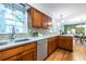 Bright kitchen with new countertops, stainless steel appliances, and wood floors at 991 Columbia Dr, Decatur, GA 30030