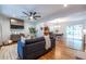 Open-concept living room with hardwood floors and view to dining room at 991 Columbia Dr, Decatur, GA 30030