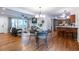 Open living space with combined dining, living, and kitchen areas featuring hardwood floors at 991 Columbia Dr, Decatur, GA 30030