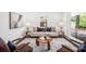 Cozy living room with contemporary decor, hardwood floors and large windows allowing ample light at 331 Zelma Sw St, Marietta, GA 30060