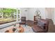 Well-lit living room featuring hardwood floors, stylish decor, and a large window at 331 Zelma Sw St, Marietta, GA 30060