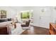 Bright living room with hardwood floors, large windows, and stylish contemporary furnishings at 331 Zelma Sw St, Marietta, GA 30060