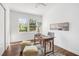 Bright office space with natural light, desk, pouf seating, and modern decor at 331 Zelma Sw St, Marietta, GA 30060