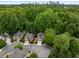 Beautiful brick homes nestled in a lush, green neighborhood with mature trees and well-maintained landscaping at 1143 Brookhaven North Cir, Brookhaven, GA 30319