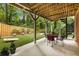 Outdoor patio area with spiral staircase and view of the backyard at 1143 Brookhaven North Cir, Brookhaven, GA 30319